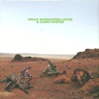 Omar Rodríguez-López & Damo Suzuki - Please Heat This Eventually vinyl cover